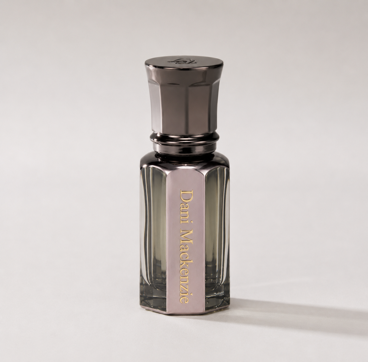 10ml Daniel's Truth Dani Mackenzie oil perfume bottle with a sleek design and clear label, shown against a neutral background.