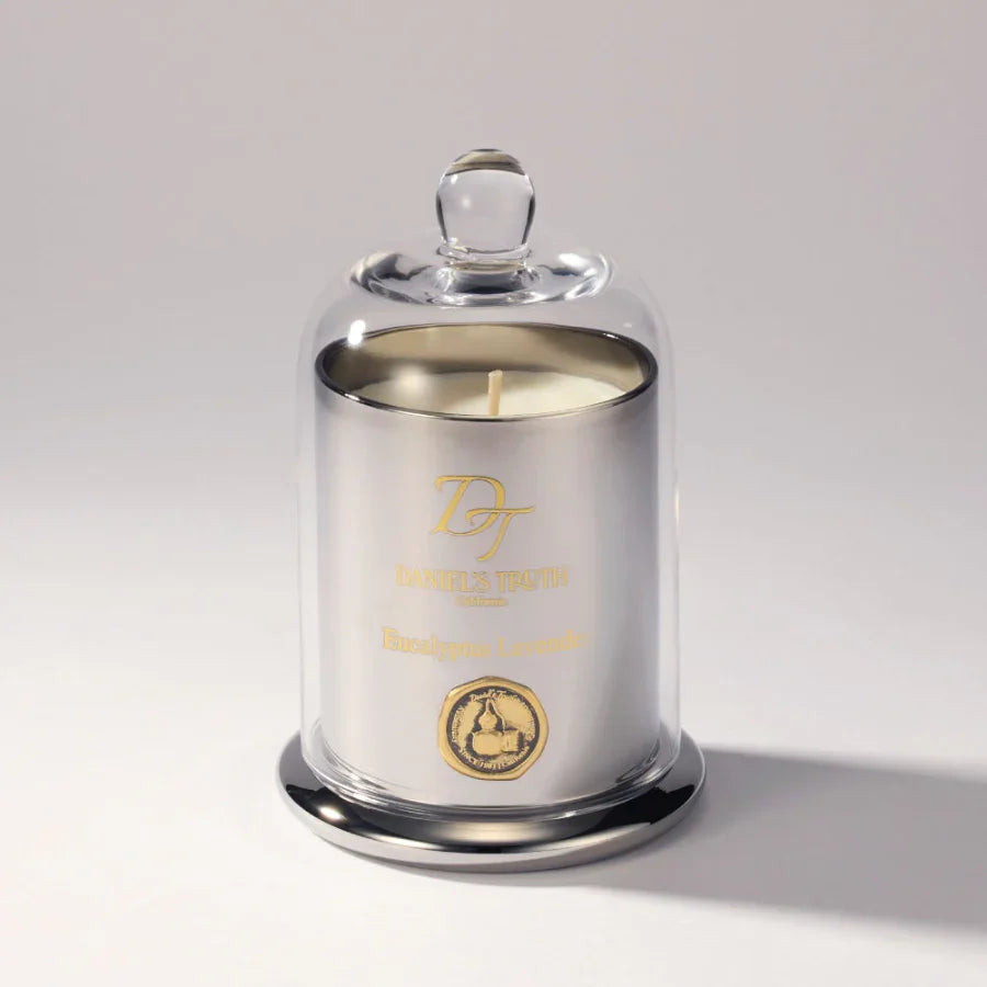 Silver eucalyptus lavender candle in glass cloche, minimalist background