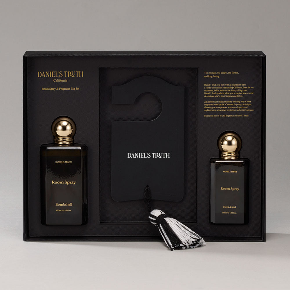Daniel's Truth room spray set with three bottles displaying floral and citrus scents on a neutral background.